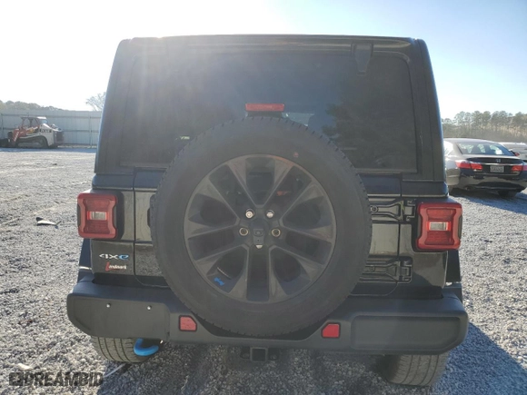 2023 Jeep Wrangler 4xe Sahara with VIN 1C4JJXP65PW585394, listed as a Copart auction lot 85741584 with 27,125 mi miles and Salvage Title. Bid and sale history available at carsss.com. Image 6.