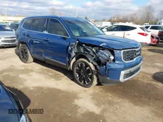 2023 Kia Telluride SX Prestige X-Line z VIN 5XYP5DGC3PG366269, wystawiony jako IAAI lot #41695405 z przebiegiem 49 676 mil mil oraz . Historia ofert i sprzedaży dostępna na DreamBid. Obrazek 1.