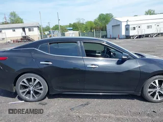 2018 Nissan Maxima SV with VIN 1N4AA6APXJC369633, listed as a IAAI auction lot 42256821 with 67,819 mi miles and . Bid and sale history available at DreamBid. Image 13.