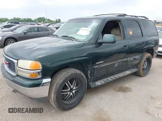 2002 GMC Yukon SLT z VIN 1GKEC13Z62R233154, wystawiony jako IAAI lot #42229172 z przebiegiem Nie podano mil oraz . Historia ofert i sprzedaży dostępna na DreamBid. Obrazek 2.