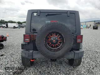 2018 Jeep Wrangler Unlimited Sport S with VIN 1C4BJWDG0JL818800, listed as a Copart auction lot 56648505 with 114,011 mi miles and Salvage Title. Bid and sale history available at DreamBid. Image 6.