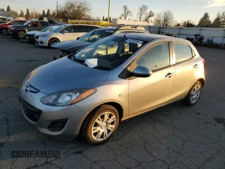 2014 Mazda 2 Sport with VIN JM1DE1KZ6E0184808, listed as a Copart auction lot 83399384 with 96,866 mi miles and Salvage Title. Bid and sale history available at carsss.com. Image 1.