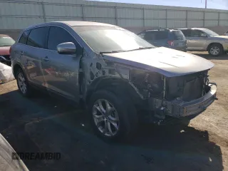 2015 Mazda CX-9 Sport with VIN JM3TB3BA7F0454891, listed as a Copart auction lot 42414995 with 68,856 mi miles and Salvage Title. Bid and sale history available at DreamBid. Image 4.