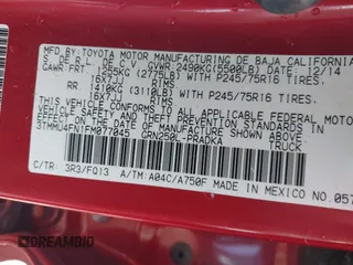 2015 Toyota Tacoma with VIN 3TMMU4FN1FM077045, listed as a IAAI auction lot 41670552 with 118,983 mi miles and . Bid and sale history available at DreamBid. Image 9.