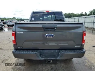 2018 Ford F-150 XL with VIN 1FTEW1EG7JFC40015, listed as a Copart auction lot 60659755 with 194,645 mi miles and Salvage title. Bid and sale history available at DreamBid. Image 6.