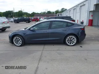 2021 Tesla Model 3 Long Range with VIN 5YJ3E1EB4MF855581, listed as a IAAI auction lot 41974515 with 71,561 mi miles. Bid and sale history available at carsss.com. Image 14.