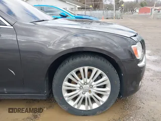 2013 Chrysler 300 C with VIN 2C3CCAKT2DH646633, listed as a IAAI auction lot 41719487 with 115,363 mi miles and . Bid and sale history available at DreamBid. Image 19.