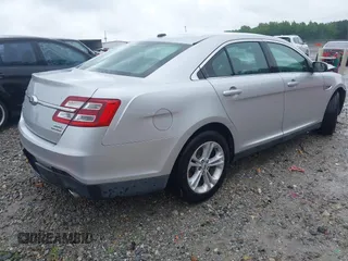 2016 Ford Taurus SEL with VIN 1FAHP2E85GG103883, listed as a IAAI auction lot 42243173 with 119,334 mi miles and . Bid and sale history available at DreamBid. Image 4.