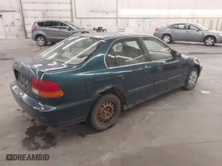 1998 Honda Civic LX with VIN 1HGEJ6675WL041842, listed as a IAAI auction lot 41336090 with 399308 miles. Bid and sale history available at carsss.com. Image 4.