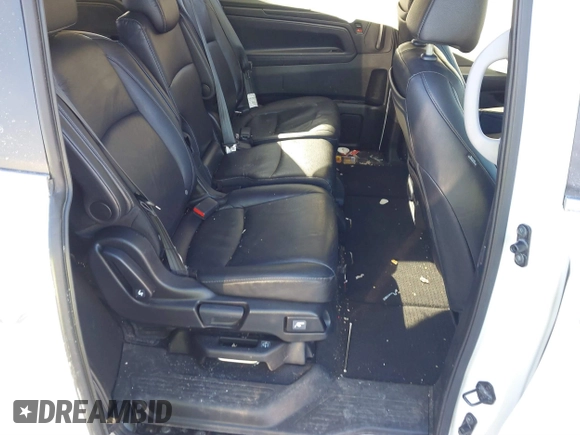 2023 Honda Odyssey Touring with VIN 5FNRL6H81PB008129, listed as a IAAI auction lot 41610714 with 57,273 mi miles and . Bid and sale history available at DreamBid. Image 8.