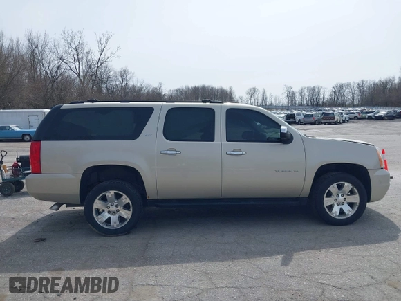 2014 GMC Yukon XL SLT with VIN 1GKS2KE71ER110308, listed as a IAAI auction lot 41940610 with 202,071 mi miles. Bid and sale history available at carsss.com. Image 13.