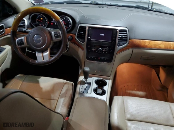 2012 Jeep Grand Cherokee Overland with VIN 1C4RJFCT5CC185100, listed as a Copart auction lot 42745615 with 126,696 mi miles and Salvage Title. Bid and sale history available at carsss.com. Image 8.