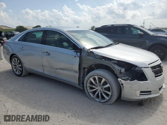 2016 Cadillac XTS Luxury Collection z VIN 2G61M5S30G9104763, wystawiony jako Copart lot #56464505 z przebiegiem 54 309 mil mil oraz Szkoda całkowita • Salvage title. Historia ofert i sprzedaży dostępna na DreamBid. Obrazek 4.