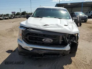 2022 Ford F-150 XL z VIN 1FTFX1E86NKD22373, wystawiony jako Copart lot #69963114 z przebiegiem 96 983 mil mil oraz Szkoda całkowita • Salvage title. Historia ofert i sprzedaży dostępna na DreamBid. Obrazek 5.