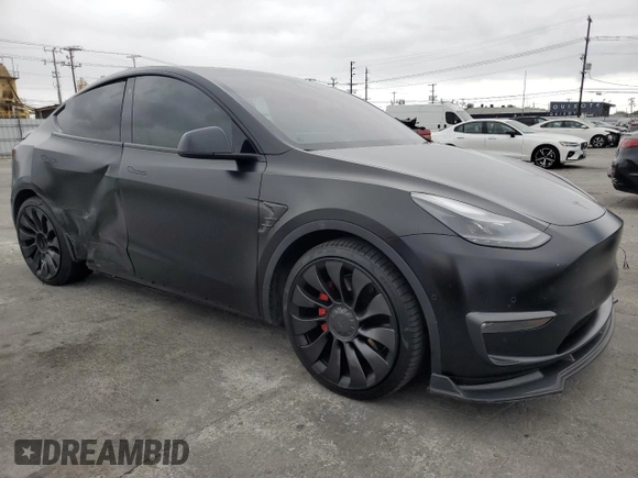 2022 Tesla Model Y Performance with VIN 7SAYGDEF7NF318647, listed as a Copart auction lot 53822465 with 38,724 mi miles and Salvage title. Bid and sale history available at DreamBid. Image 4.