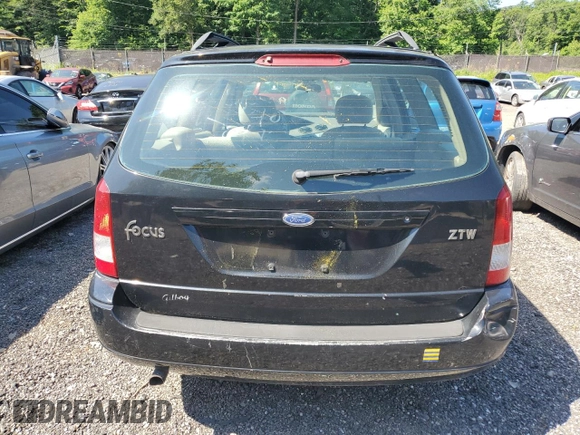 2004 Ford Focus ZTW with VIN 1FAFP35Z84W203676, listed as a Copart auction lot 57272835 with 183,115 mi miles and Salvage title. Bid and sale history available at DreamBid. Image 6.