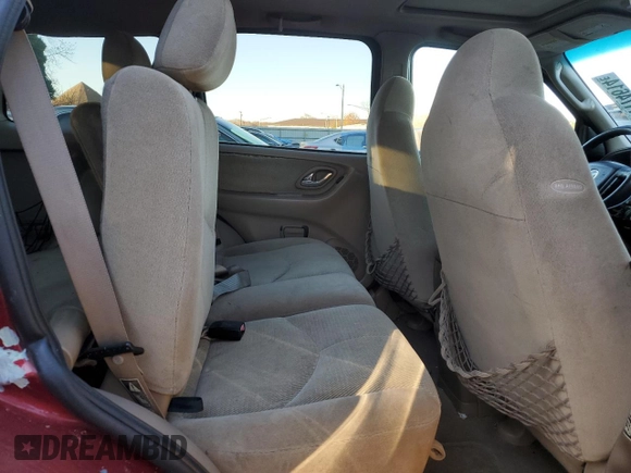 2001 Mazda Tribute LX with VIN 4F2CU08111KM19933, listed as a Copart auction lot 81174614 with 209,736 mi miles and Salvage Title. Bid and sale history available at DreamBid. Image 11.