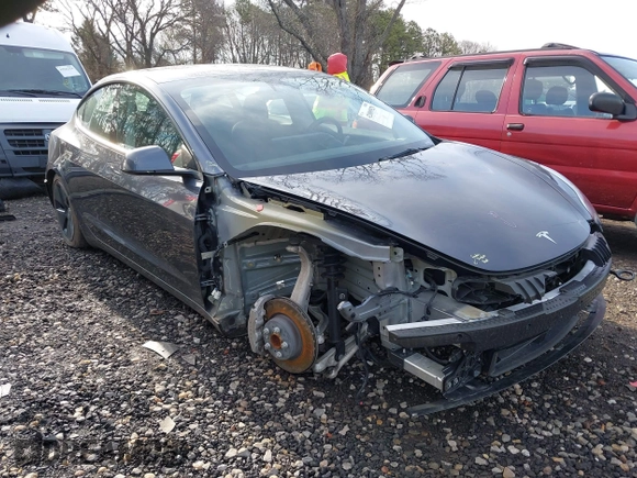 2023 Tesla Model 3 with VIN 5YJ3E1EAXPF666252, listed as a IAAI auction lot 42009929 with 27,328 mi miles and . Bid and sale history available at DreamBid. Image 1.