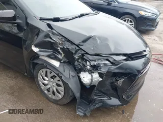 2019 Toyota Corolla L z VIN 2T1BURHEXKC203410, wystawiony jako IAAI lot #41898798 z przebiegiem 26 311 mil mil oraz . Historia ofert i sprzedaży dostępna na DreamBid. Obrazek 6.