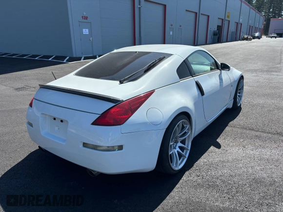 2004 Nissan 350Z Touring with VIN JN1AZ34D94T160040, listed as a Copart auction lot 53745895 with 120,037 mi miles and Clean Title. Bid and sale history available at carsss.com. Image 4.