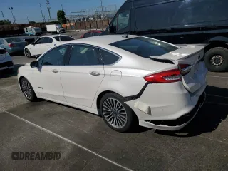 2018 Ford Fusion Titanium with VIN 3FA6P0RU4JR134142, listed as a Copart auction lot 52046465 with 91,018 mi miles and Salvage Title. Bid and sale history available at DreamBid. Image 2.