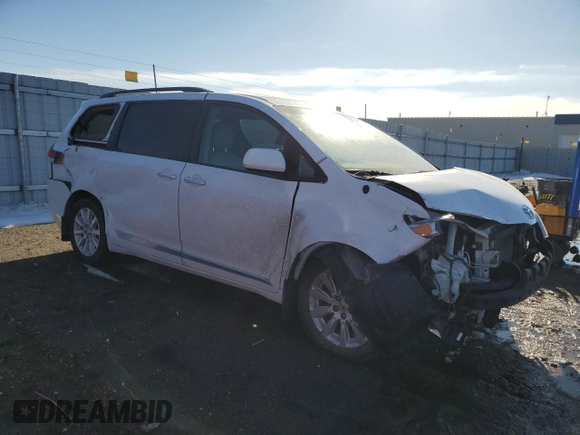 2014 Toyota Sienna Ltd with VIN 5TDDK3DC2ES074333, listed as a Copart auction lot 50021345 with 116,870 mi miles and Salvage Title. Bid and sale history available at carsss.com. Image 4.
