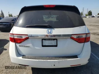 2011 Honda Odyssey LX z VIN 5FNRL5H2XBB054864, wystawiony jako Copart lot #59002395 z przebiegiem 146 987 mil mil oraz Czysty tytuł • Clean title. Historia ofert i sprzedaży dostępna na DreamBid. Obrazek 6.