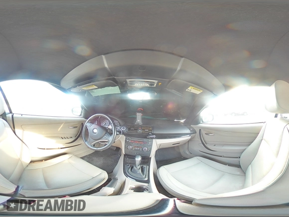2011 BMW 1 Series 128i with VIN WBAUN1C58BVH82487, listed as a Copart auction lot 54295625 with 60,879 mi miles and Salvage title. Bid and sale history available at DreamBid. Image 14.