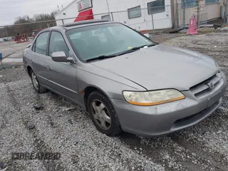 2000 Honda Accord EX z VIN 1HGCG5658YA142693, wystawiony jako IAAI lot #41618554 z przebiegiem 302 381 mil mil oraz . Historia ofert i sprzedaży dostępna na DreamBid. Obrazek 1.