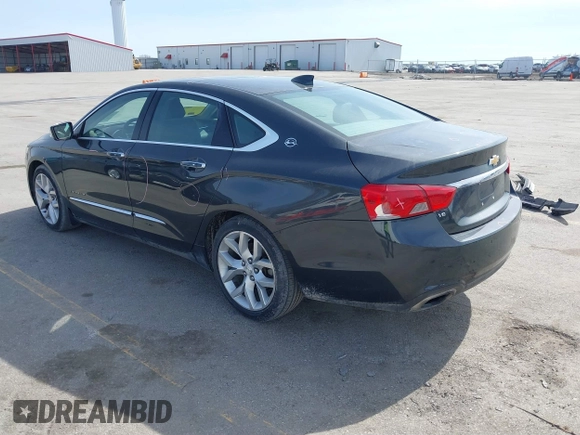 2015 Chevrolet Impala LTZ with VIN 1G1165S39FU138640, listed as a IAAI auction lot 41780288 with 145,000 mi miles and . Bid and sale history available at DreamBid. Image 3.