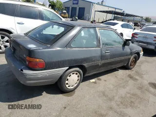 1992 Ford Escort z VIN 1FAPP11JXNW156984, wystawiony jako Copart lot #63462264 z przebiegiem 37 774 mil mil oraz Szkoda całkowita • Salvage title. Historia ofert i sprzedaży dostępna na DreamBid. Obrazek 3.