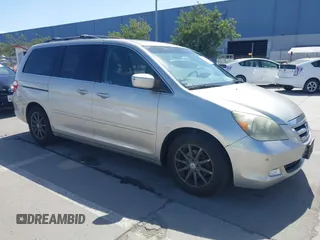 2006 Honda Odyssey Touring z VIN 5FNRL38896B016556, wystawiony jako IAAI lot #41955817 z przebiegiem 195 150 mil mil oraz . Historia ofert i sprzedaży dostępna na DreamBid. Obrazek 1.