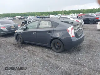 2013 Toyota Prius One with VIN JTDKN3DU8D1716993, listed as a IAAI auction lot 42202519 with 182,421 mi miles and . Bid and sale history available at DreamBid. Image 14.