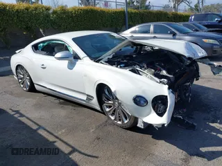 2022 Bentley Continental GT GT V8 z VIN SCBCG2ZG5NC093224, wystawiony jako IAAI lot #41165429 z przebiegiem Nie podano mil oraz . Historia ofert i sprzedaży dostępna na DreamBid. Obrazek 1.