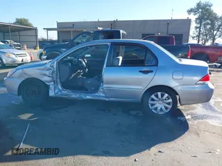 2006 Mitsubishi Lancer ES with VIN JA3AJ26E06U057959, listed as a IAAI auction lot 41347649 with 122,963 mi miles. Bid and sale history available at carsss.com. Image 15.