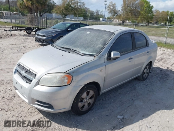 2007 Chevrolet Aveo LS with VIN KL1TD56687B084620, listed as a IAAI auction lot 41719793 with 119,233 mi miles and . Bid and sale history available at DreamBid. Image 2.