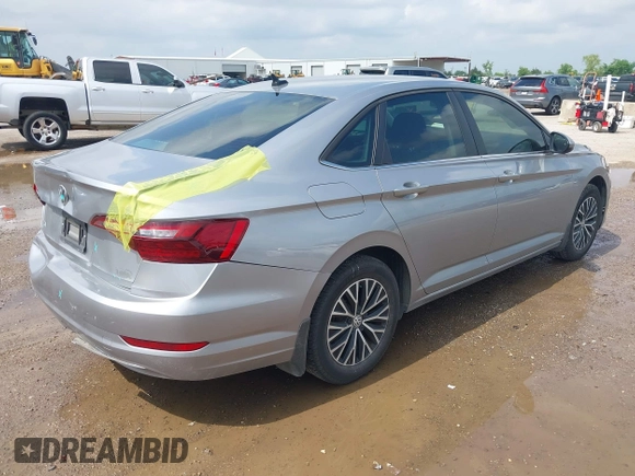 2021 Volkswagen Jetta S z VIN 3VWC57BU4MM094780, wystawiony jako IAAI lot #42103554 z przebiegiem 49 044 mil mil oraz . Historia ofert i sprzedaży dostępna na DreamBid. Obrazek 4.