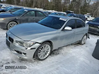 2013 BMW 3 Series 328i xDrive with VIN WBA3B3C5XDJ977160, listed as a Copart auction lot 47036785 with 197,512 mi miles and Clean title. Bid and sale history available at DreamBid. Image 1.