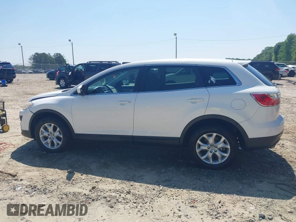 2011 Mazda CX-9 Sport with VIN JM3TB2BA7B0304087, listed as a IAAI auction lot 42138663 with 186,964 mi miles and . Bid and sale history available at DreamBid. Image 14.
