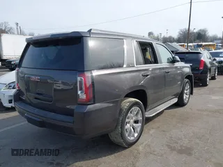 2015 GMC Yukon SLE with VIN 1GKS1AKCXFR269862, listed as a IAAI auction lot 41784763 with 156,286 mi miles. Bid and sale history available at carsss.com. Image 4.