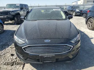 2017 Ford Fusion SE with VIN 3FA6P0H7XHR372275, listed as a Copart auction lot 48430005 with 103,904 mi miles and Salvage Title. Bid and sale history available at carsss.com. Image 5.