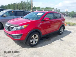 2011 Kia Sportage LX with VIN KNDPBCA20B7062048, listed as a IAAI auction lot 42583028 with 149,974 mi miles and . Bid and sale history available at DreamBid. Image 2.
