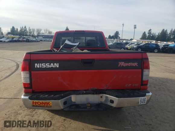 1999 Nissan Frontier XE with VIN 1N6ED26Y2XC312863, listed as a Copart auction lot 42259015 with 212,666 mi miles and Salvage title. Bid and sale history available at DreamBid. Image 6.
