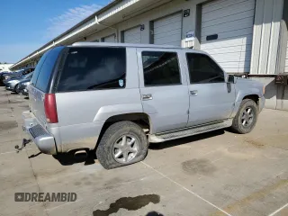 1999 GMC Denali z VIN 1GKEK13R0XR916686, wystawiony jako Copart lot #61120914 z przebiegiem 240 605 mil mil oraz Szkody całkowita. Historia ofert i sprzedaży dostępna na DreamBid. Obrazek 3.