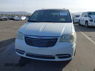 2012 Chrysler Town & Country Touring z VIN 2C4RC1BGXCR410507, wystawiony jako IAAI lot #41215704 z przebiegiem 161 501 mil mil oraz . Historia ofert i sprzedaży dostępna na DreamBid. Obrazek 6.
