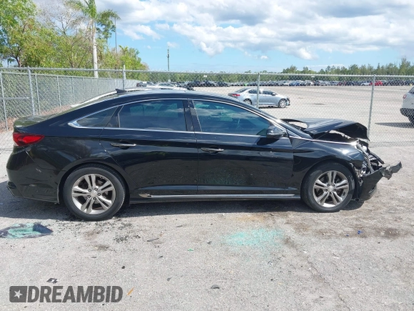 2018 Hyundai Sonata SEL with VIN 5NPE34AF3JH647018, listed as a IAAI auction lot 41687419 with 97,561 mi miles and . Bid and sale history available at DreamBid. Image 13.