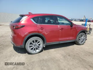 2019 Mazda CX-5 Grand Touring with VIN JM3KFBDM7K1668396, listed as a Copart auction lot 59732785 with 23,855 mi miles and Salvage title. Bid and sale history available at DreamBid. Image 3.