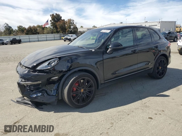 2017 Porsche Cayenne Turbo with VIN WP1AC2A2XHLA92055, listed as a Copart auction lot 52610555 with 82,224 mi miles and Salvage title. Bid and sale history available at DreamBid. Image 1.