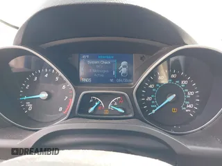 2015 Ford Escape SE with VIN 1FMCU0GXXFUB99852, listed as a IAAI auction lot 41704198 with 84,735 mi miles. Bid and sale history available at carsss.com. Image 7.