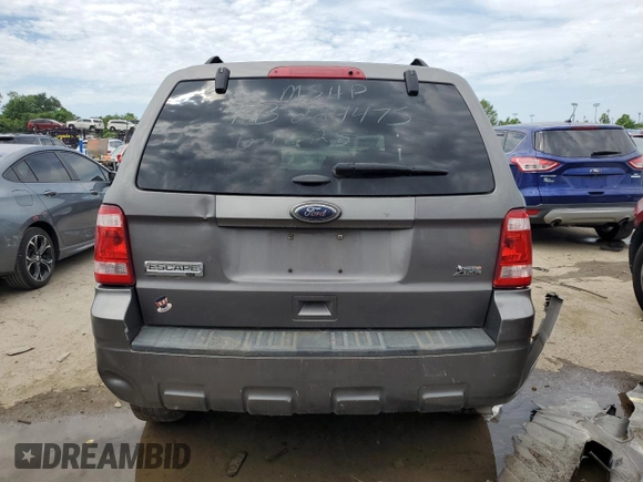 2012 Ford Escape XLT with VIN 1FMCU9DG8CKB42968, listed as a Copart auction lot 61763275 with 233,998 mi miles and Salvage title. Bid and sale history available at DreamBid. Image 6.